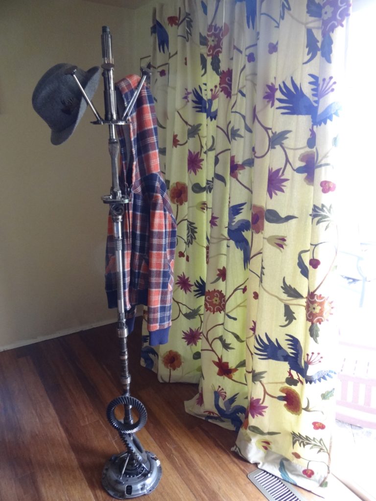 Upright coat rack.